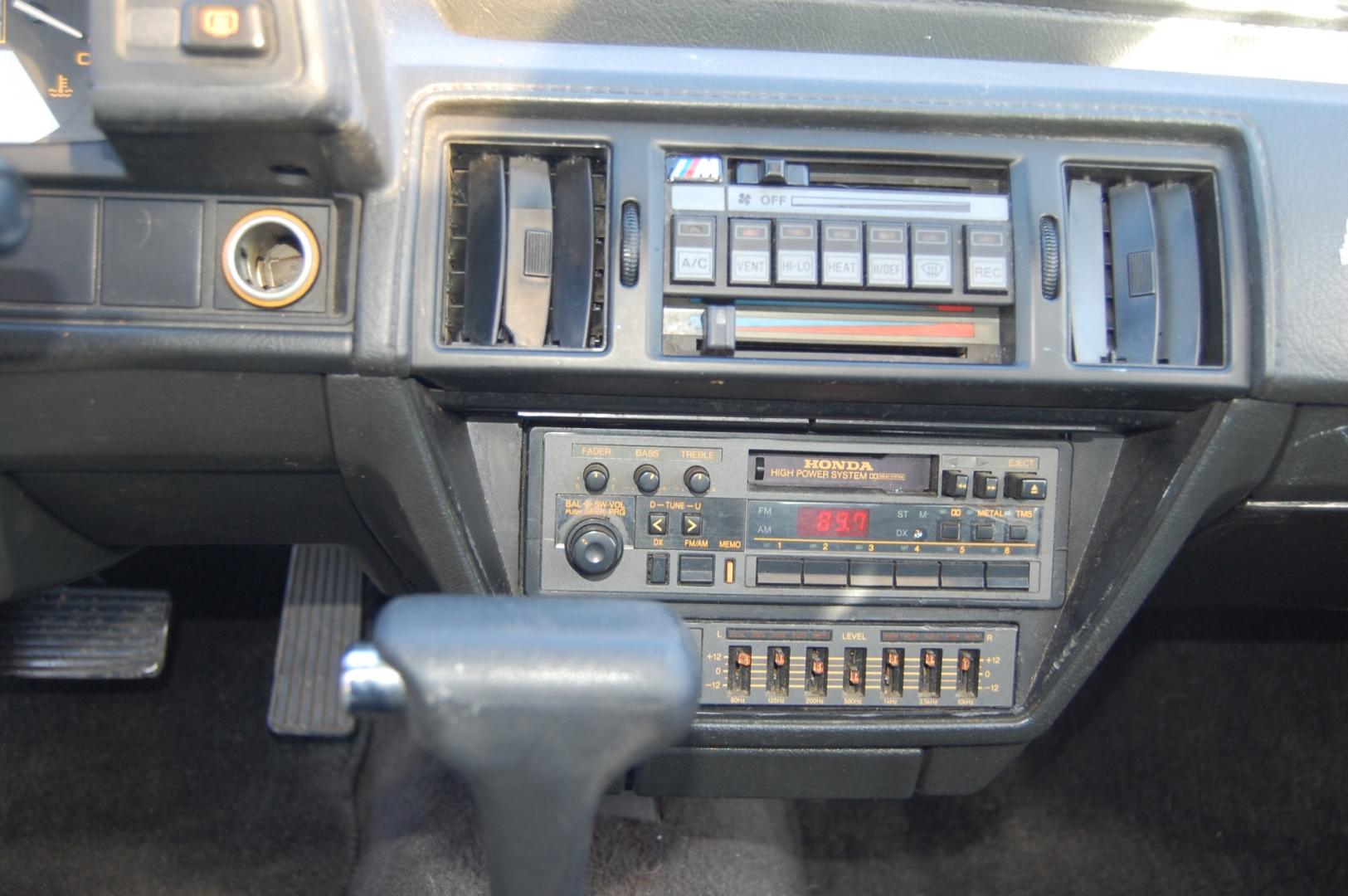 1987 Black /Gray Honda Prelude Si (JHMBA3248HC) with an 2.0L 4 cylinder engine, Automatic transmission, located at 6528 Lower York Road, New Hope, PA, 18938, (215) 862-9555, 40.358707, -74.977882 - Here we have a 1987 Honda Prelude SI with a 2.0L 4 cylinder putting power to the front wheels via an automatic transmission. Options include: gray cloth, power windows/locks/mirrors, AM/FM/TAPE radio, heat/AC, cruise control, tilt steering wheel, 13 inch alloy wheels, pop up headlights and a moon ro - Photo#12